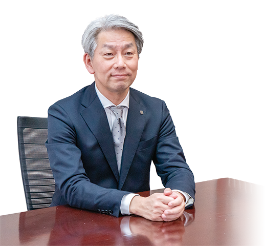 写真:代表取締役社長 八重島真人